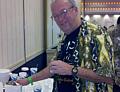 Bruce Plott serves up a pot of mat&eacute; at the Atlanta jugglers table