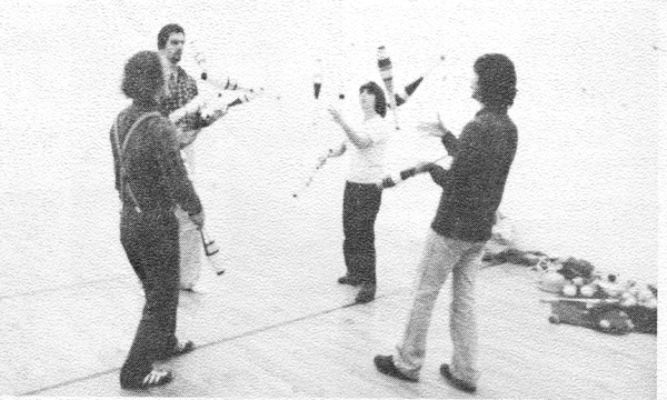 Members of the Buffalo, NY, juggling club do it on a racquet ball court. 