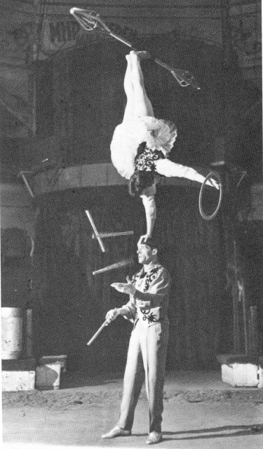 Ignatov's teacher, Violetta Kiss, balanced atop her husband, Alexander.  1959.