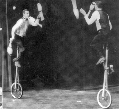 The Karvounis Brothers as "Doubble Troubble" passign from a high perch in the Cascade show (Calzar "The Great Ballini" photo)