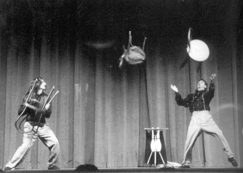 Silver Medallists Dextre Tripp (l) and Reid Belstock clown around with chairs as "Tripp and Fall" (Bill Giduz photo)