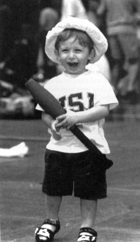 Young Alex Salberg took delight on the gym floor in catching a club. (Glen Korengld photo) 