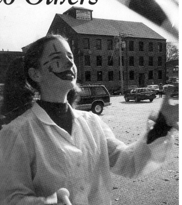 VMG Treasurer Dawn Stackhouse practices clubs while warming up for a parade (Dorothy Spiller photo)