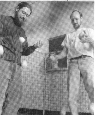 (Bottom Right) (l-r) Andy Ford and Fran Favorini practice ball bouncing in a custom-made netted cage (Bill Giduz photo)