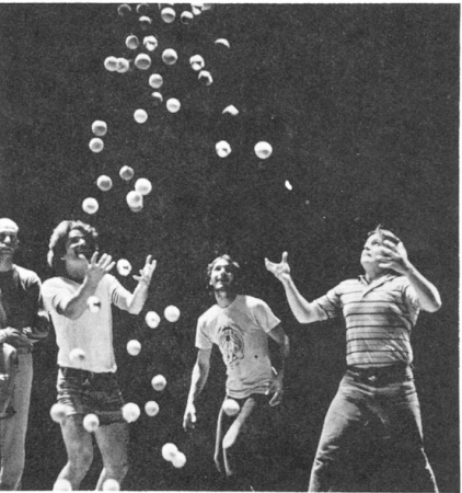 Seven ball jugglers in the big throw up.