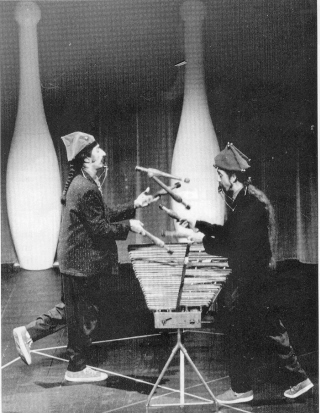 The Karamazov Brothers (here, Paul Magid and Howard Patterson) created new forms of expression by making music with juggling props.