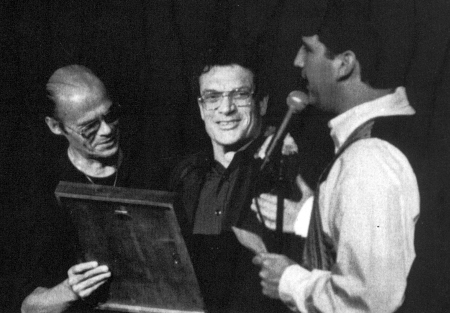 Ernst Montego receives the Historical Achievement Award from Karl-Heinz Ziethen and emcee Pat Hazzell.  (Barry Korengold photo)