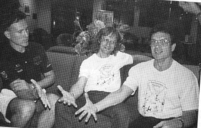 Albert Lucas, Sergei Ignatov, Ernst Motego, up too late in the hotel lobby and too tired to juggle play "Scissors, Rocks, Paper" instead. (l-r) (Roni Lynn photo)